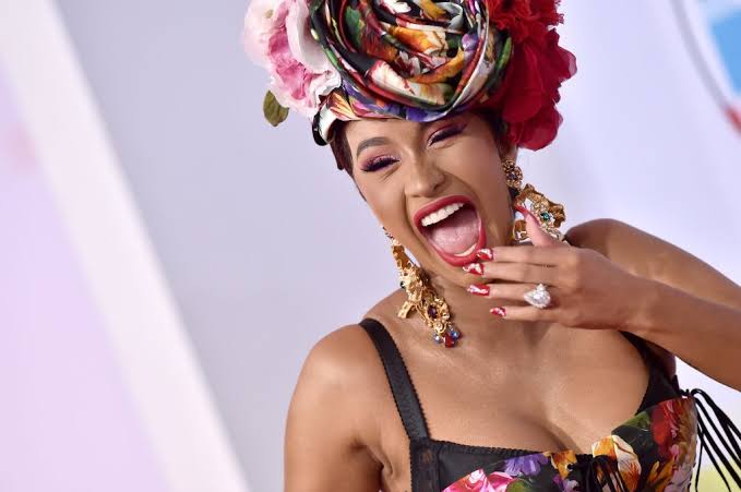 Cardi B top female fans goes braless in solidarity of their celebrity nude reveal.