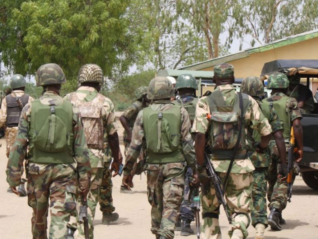 ISWAP fighters drops arms surrenders with families Nigerian Army