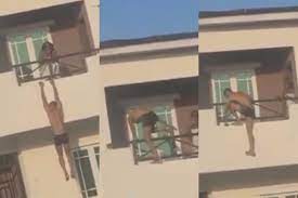 After being caught bunking another mans wife a man nearly jumps to his death.