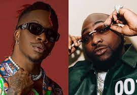 Watch the moment Singer Oxlade charts how Davido gave him his costly suit