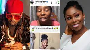 A lady shares a post she got from singer Rudeboy cursing her for bullying his lover