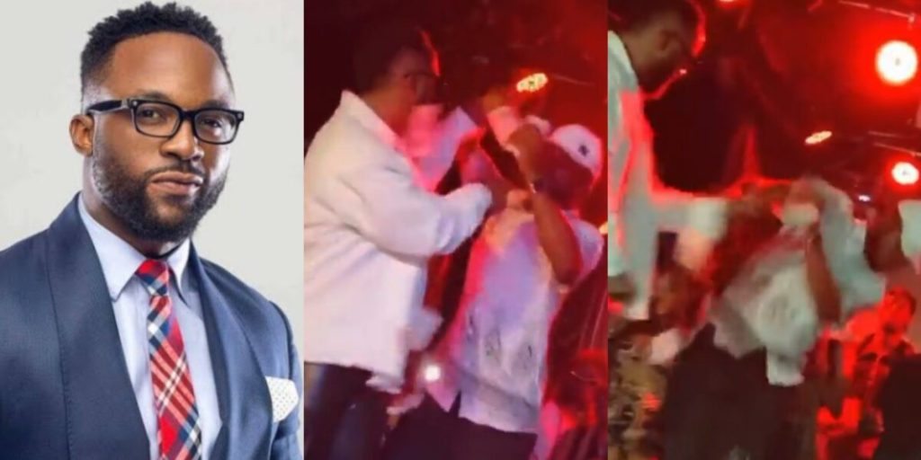 Moment Iyanya pushes fan off stage for slapping him with money (Video)