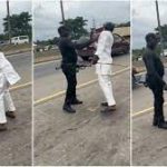 Watch the angry moment a police officer was caught on camera assaulting a man in Port Harcourt